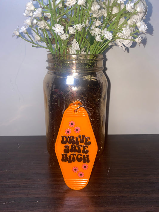 Drive safe orange Motel key chain
